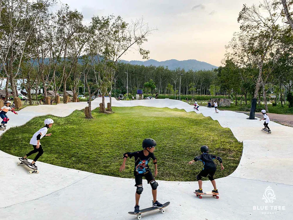 Kids skating around the track at Blue Tree Phuket
