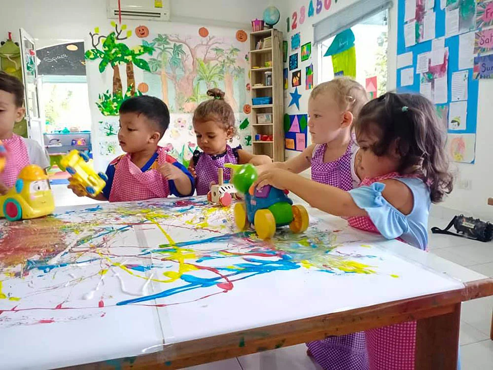 Kids playing with toys in a classroom