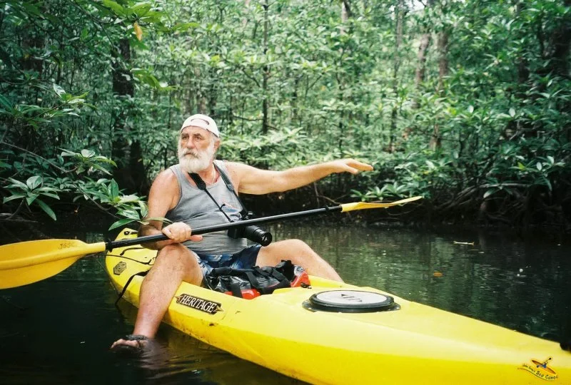 the legendary John Gray in a sea kayak