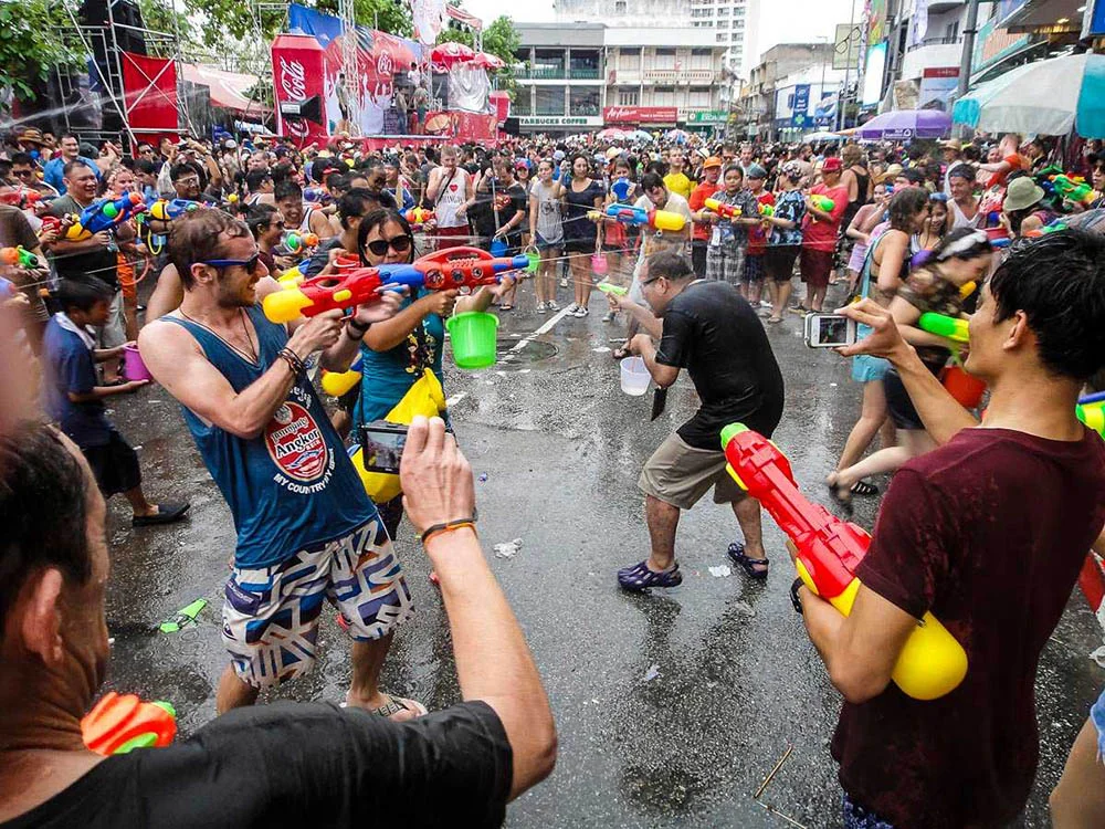 Tourists and locals enjoying a water fight