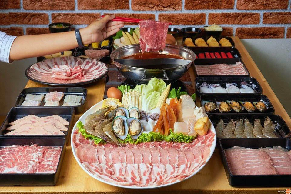 Platter with meats, seafood, and vegetables