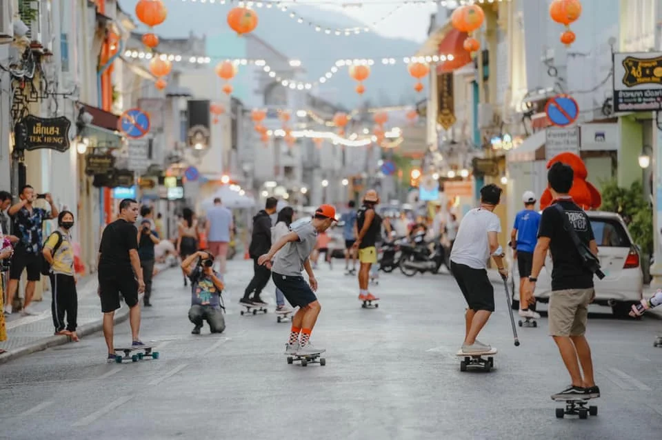 A group of surf skaters along Thaland Road in Phuket Town