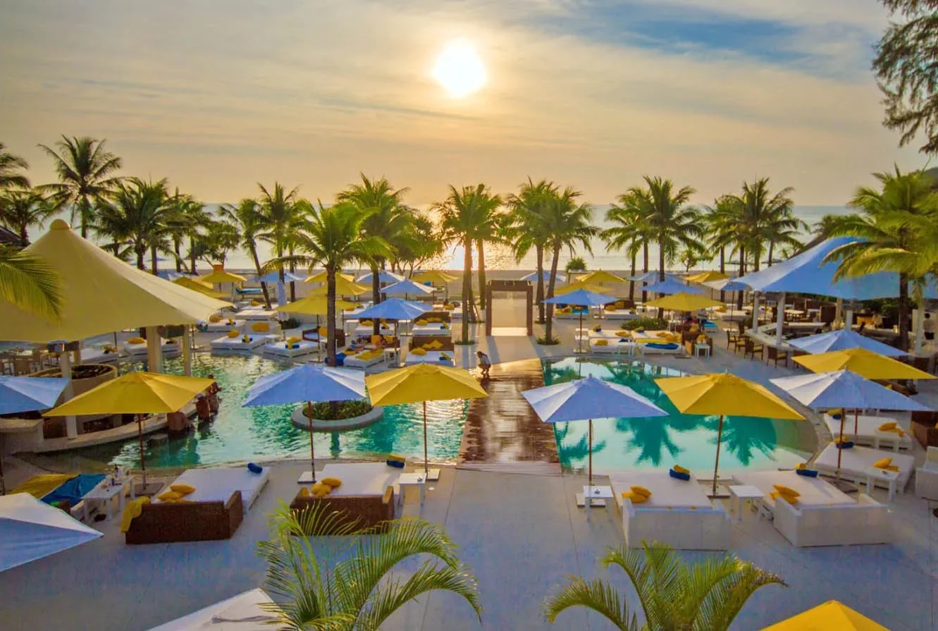 Sunset over the pool area of Dream Beach Club